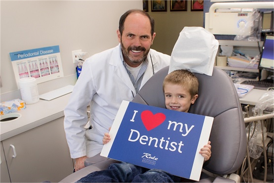 Gurnee IL dentist Bradley Rule DDS with young patient