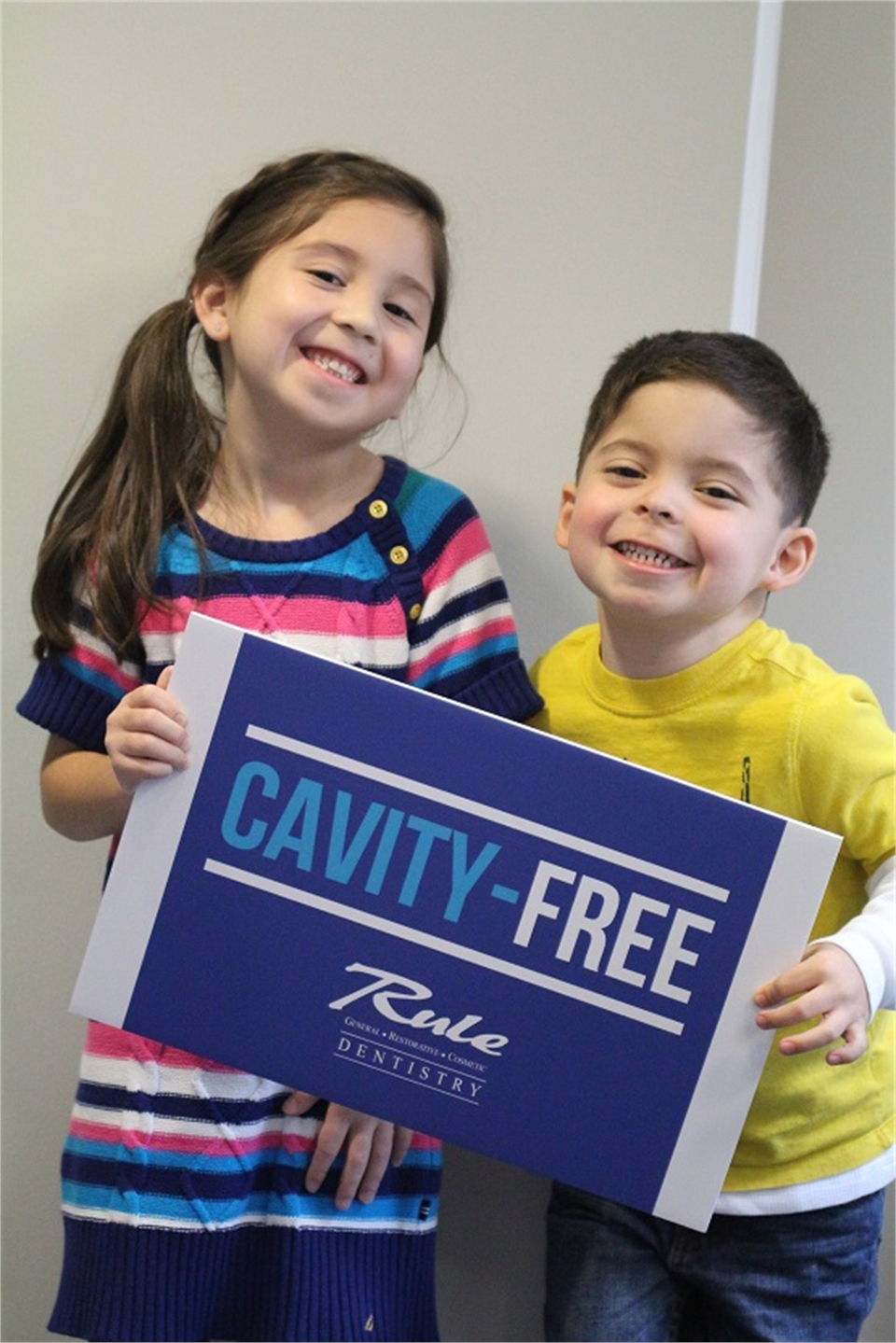 Young cavity free patients smiling with smiles at Gurnee IL dentist Bradley Rule DDS