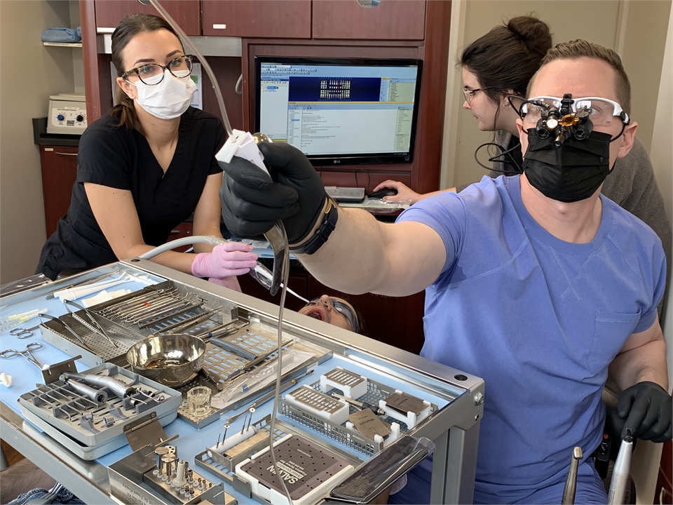 Kelowna dentist Dr. Webster performing root canal procedure at Kelowna Dental Centre