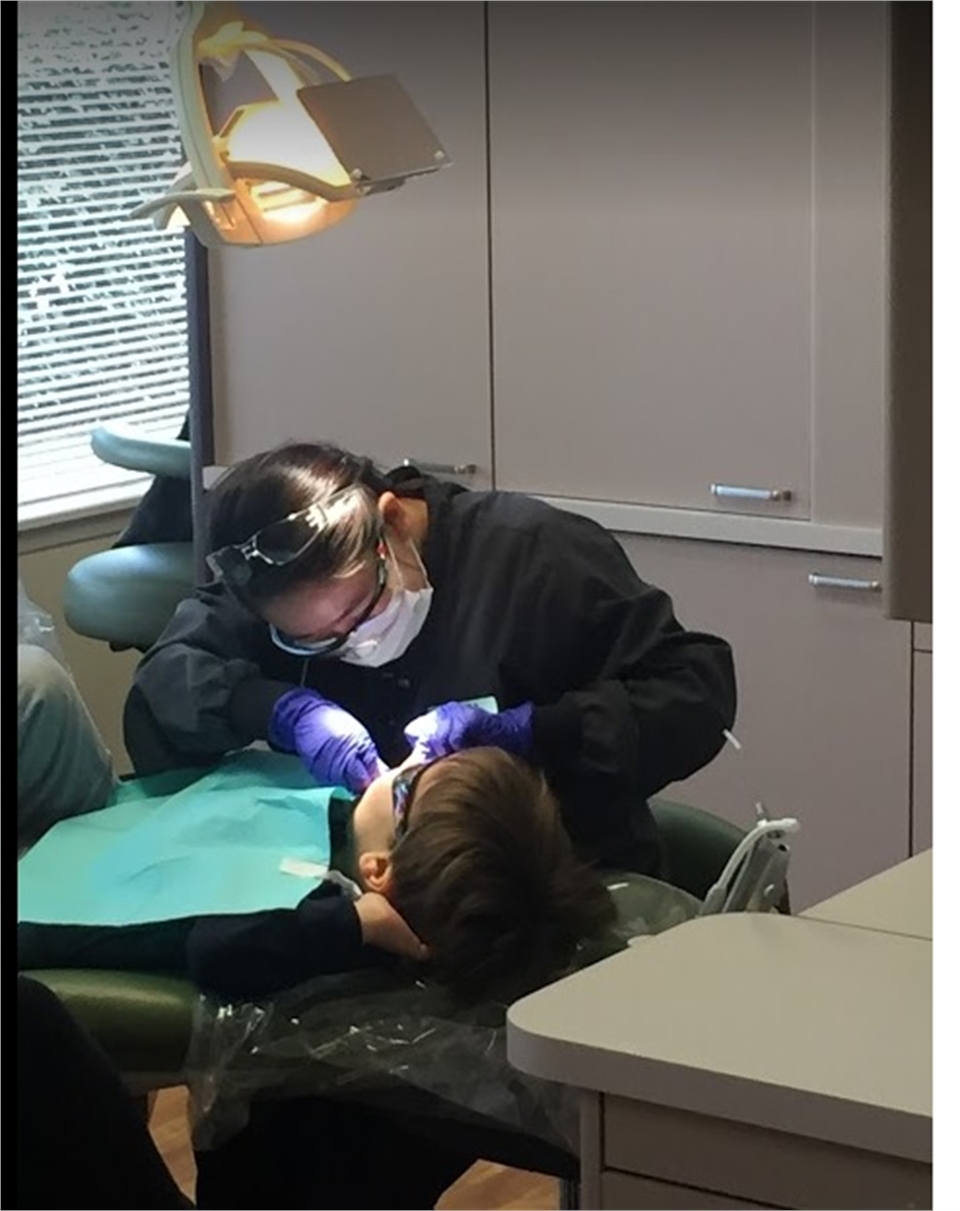 Seattle Pediatric dentist at work at Fidler On The Tooth | Dentagama