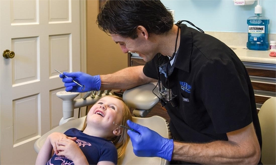 Dr. Anderson with a young patient