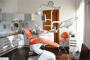 Orange and white dental chair