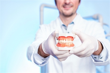 How Denture Repairs Service Benefits The Health Of Your Gums