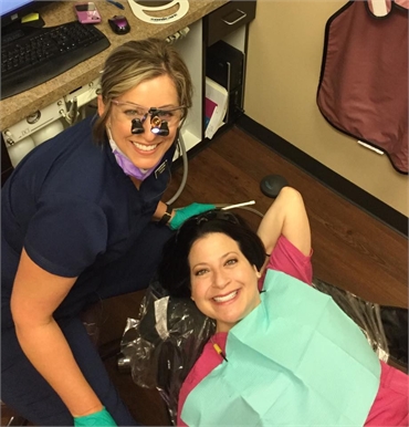 Irving dentist of Erickson Dental working on teeth whitening