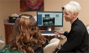 Dr. Christine Brown working with a patient
