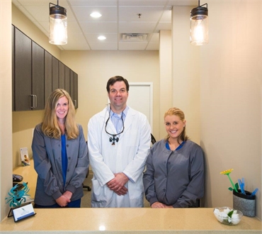 Dr Andy Game with frontdesk staff at Stono Dental Care
