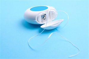 Dental floss is used for cleaning plaque and debris in between teeth.