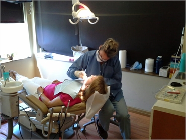 Dental hygienist at work at White Plains dentist Westchester Dental Group