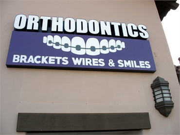 Singnboard of Brackets Wires and Smiles Orthodontic care  Vista CA 92084