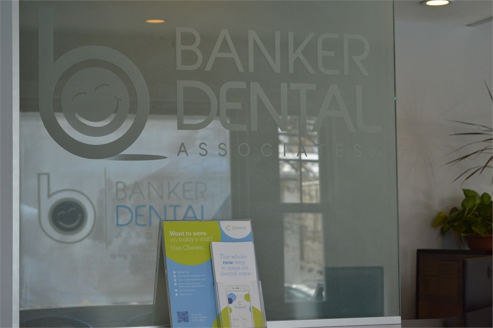 Signage on glasspane at Banker Dental Associates
