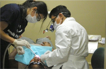 Dr. Pary performing root canal at his dentistry in Shreveport LA