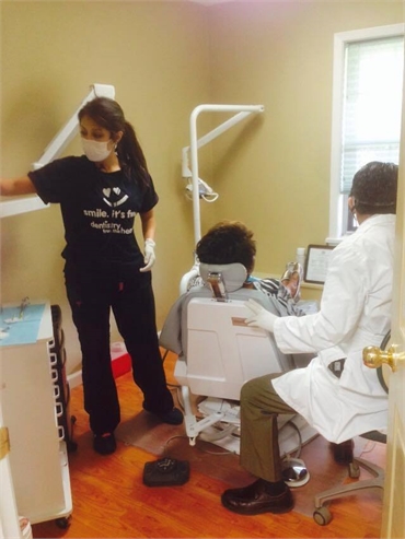 Dr. Mario Pary performs dental implants procedure at his dental clinic in Shreveport LA