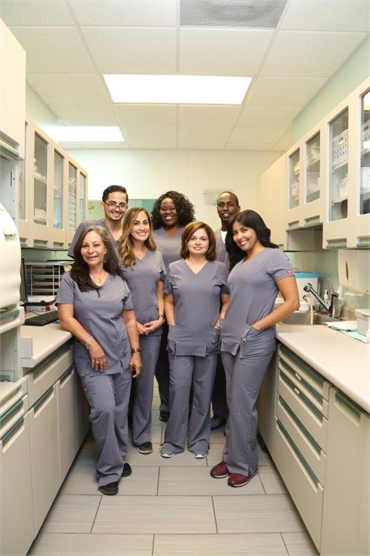 Hygiene team in sterilization area at Smile Design Dental of Coral Springs