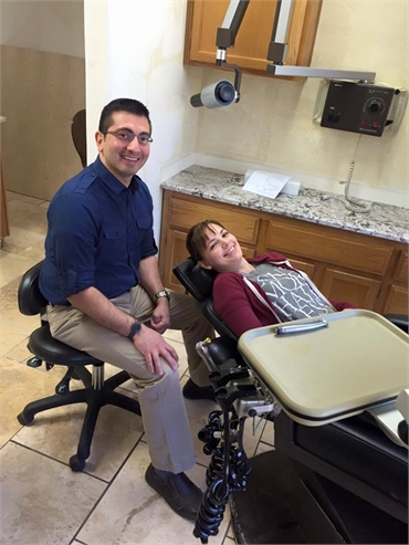 Dr. Pouya Momtaz with his dental implants patient at Aces Dental Flagstaff