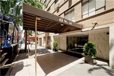 Entrance to our dentistry office on W 54th Street opposite New York Hilton Midown