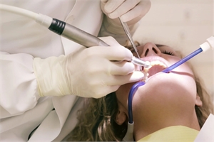 Dental drill in patient's mouth