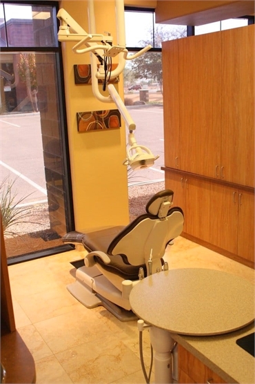 Dental chair and view outside at Riggs Family Dental located 9.7 miles to the south of A J Chandler 