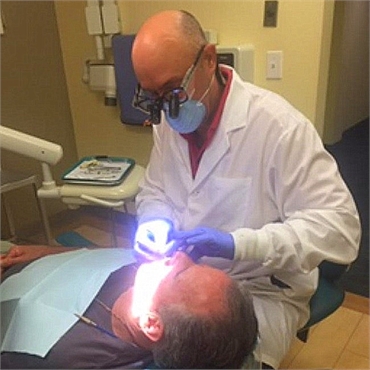 West Haven's top dentist Dr. Joseph D. Tartagni at work in Shoreline Dental Care