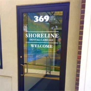 Signage on front door at Shoreline Dental Care West Haven CT 06516
