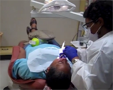 Dental hygienist at work at Premier Dental Care Washington DC