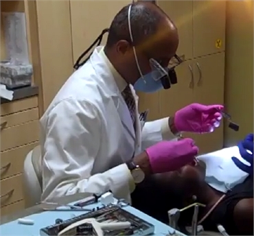 Dr Daniel Hines performing dental implants at Premier Dental Care Washington DC