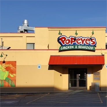 Popeyes Louisiana Kitchen 5 minutes walk to the southeast of Anchorage's best dental implant special