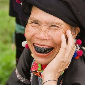 Tooth blackening tradition is painting your teeth black with blackening agent