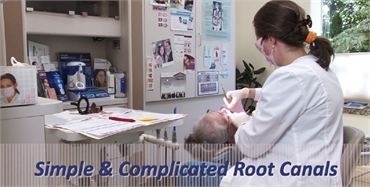 Dentist performing root canal at Portland endodontics center Powell Family Dental Care