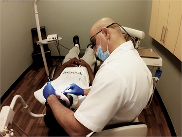 Woodbridge emergency dentist Samer Khattab DDS treating an abscessed tooth