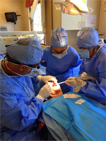 Dr Marcius and team in implant surgery at Chapel Hill Dental Care Akron