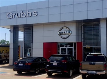 Grubbs Nissan at 4 minutes drive to the south of Bedford dentist Beelman Dental