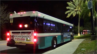Palm Tran bus leaving The Mall at Wellington Green stop to the south of Wellington FL dentist Steven