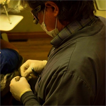 Spokane cosmetic dentist Dr. Keefe placing porcelain veneers