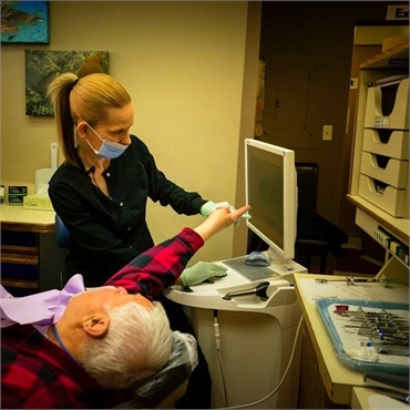 Patient talking to Dental Hygienist at 5 Mile Smiles Spokane
