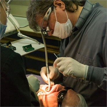 Dr. Keefe performing root canal therapy at his clinic 5 Mile Smiles Spokane
