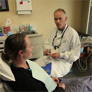 Dr. Verharen discusses treatment options with patient