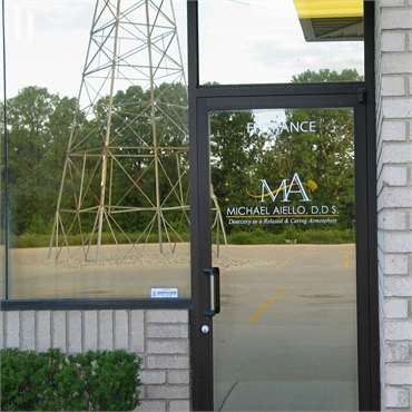 Signage at the entrance of Clinton Township cosmetic dentist Dr. Michael Aiello