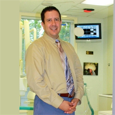Dr. Jordan Lewart DMD at his Orangeburg dental clinic Orangetown Smiles