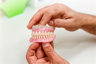 How Do dentists ensure a comfortable fit for partial dentures