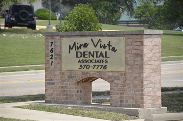 Outdoor signboard at Fort Worth dentist Mira Vista Dental Associates
