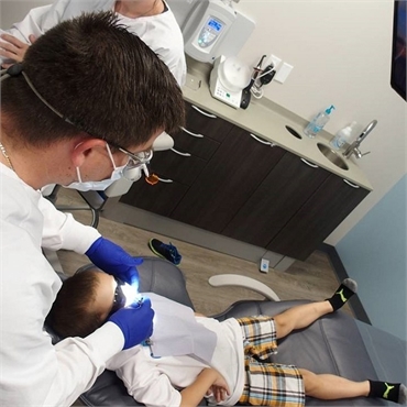 Hugo childrens dentist Dr. Brent Sorenson working on one of his patients at Sorenson Dental Hugo MN 