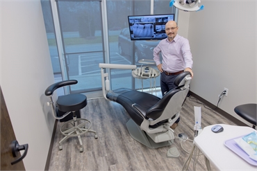 Chapel Hill dentist Dr. Mistry in the state of the art operatory at Everbright Dental