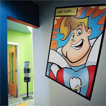 Comic themed walled murals and  other attractions at Smile Shoppe Pediatric Dentistry Springdale AR 