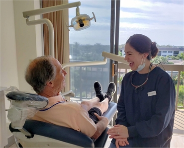 Naples dentist Dr. Matonti shares lighter moments with dental implants patient at Matonti Dental