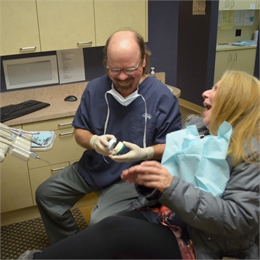 Dr. Hickey sharing lighter moments with patient at Sound to Mountain Dental Health Center Tacoma WA