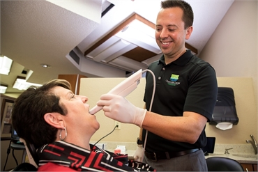 Dr. Burton using 3Shape TRIOS Intraoral Scanner at Clearwater Dental Associates