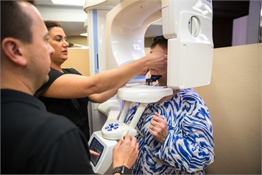 Patient having 3d xray at Clearwater dental Associates