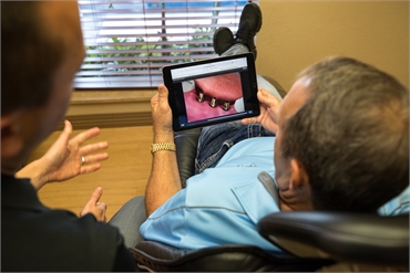 Clearwater dentist Dr.Burton discussing dental implant options