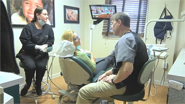 Clementon dentist Dr. Kenneth Soffer fixing dental crown at Clementon Family Dentistry