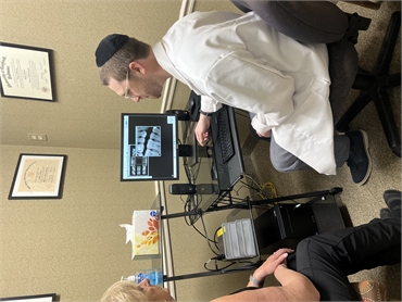 Dr. Lehrfield demonstrating Dental Crown procedure to patient at The Smile Design Center of Dr. Yehu